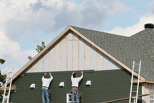 Professional Vinyl Siding technician working in Spring, TX